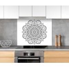 Fond de hotte fresque de mandalas noirs sur blanc